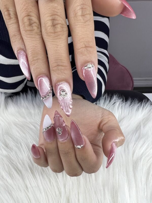 Pink nails with sparkling gem details