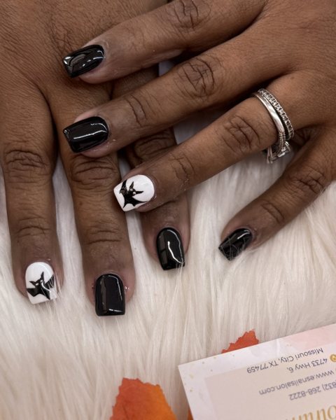 Black and white bat nails done at ES Nail Spa